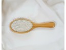 Large round metal hairbrush