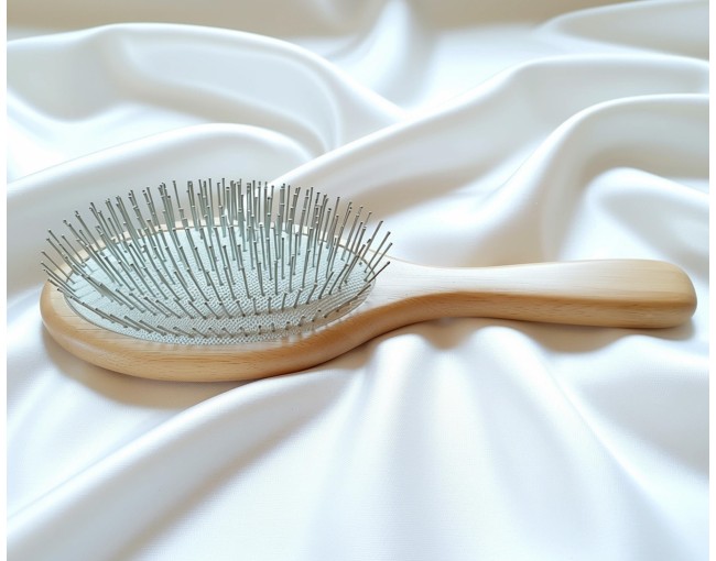 Large round metal hairbrush