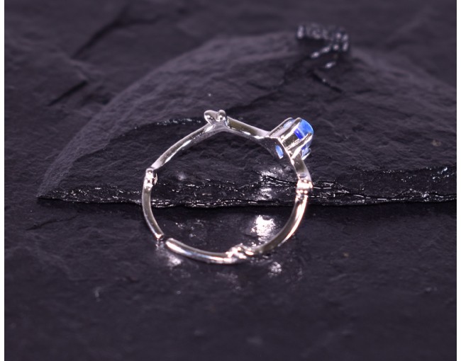 Offener Silberring mit blauem Kristall