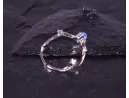 Offener Silberring mit blauem Kristall