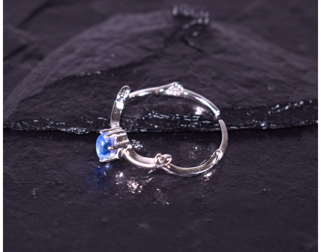 Offener Silberring mit blauem Kristall
